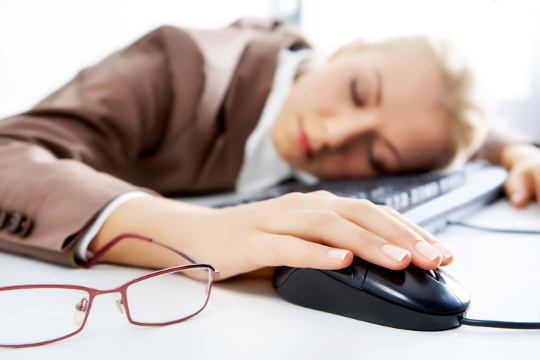 woman asleep at computer